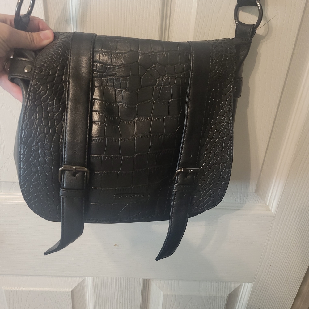 Metal Mulisha saddle bag with matching wallet.
